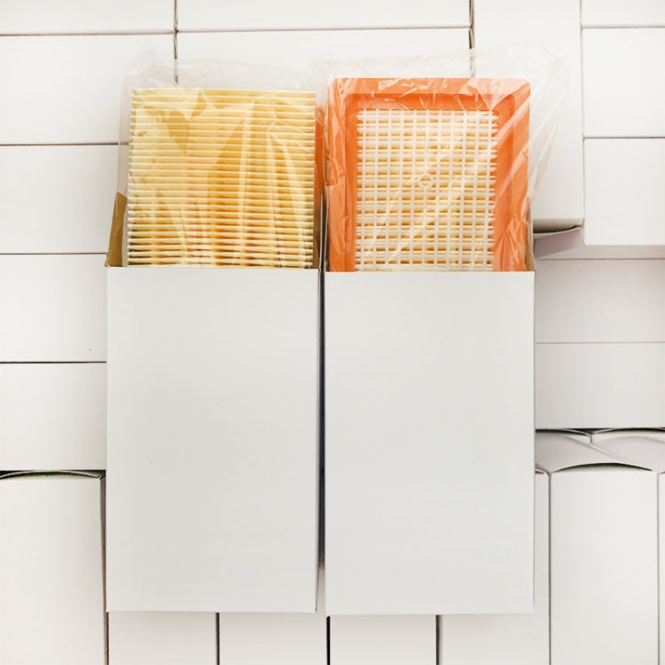 Two vacuum filter elements packed in a box, orange frames with yellow media