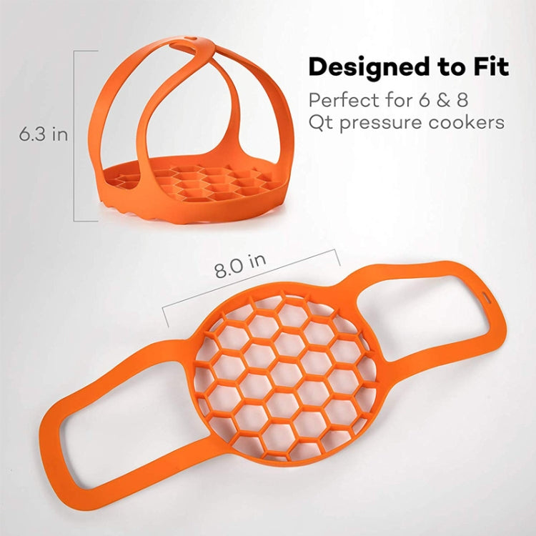 Orange silicone steamer egg cooker basket with hex-pattern tray and carrying loop
