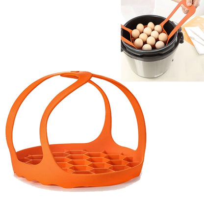 Orange silicone steamer egg cooker basket with handles and egg tray grid