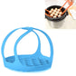 Blue silicone steamer egg cooker basket with arched handle and raised egg tray