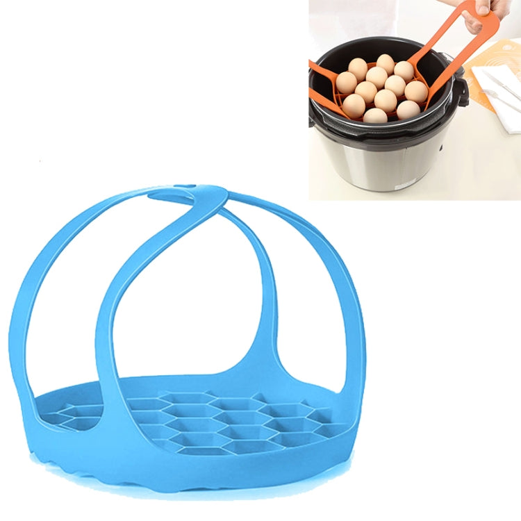 Blue silicone steamer egg cooker basket with arched handle and raised egg tray
