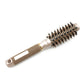 Round ceramic hair styling brush with black nylon bristles and beige-gold handle