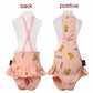 Pink banana-printed dog physiological pants shown front and back on a mannequin
