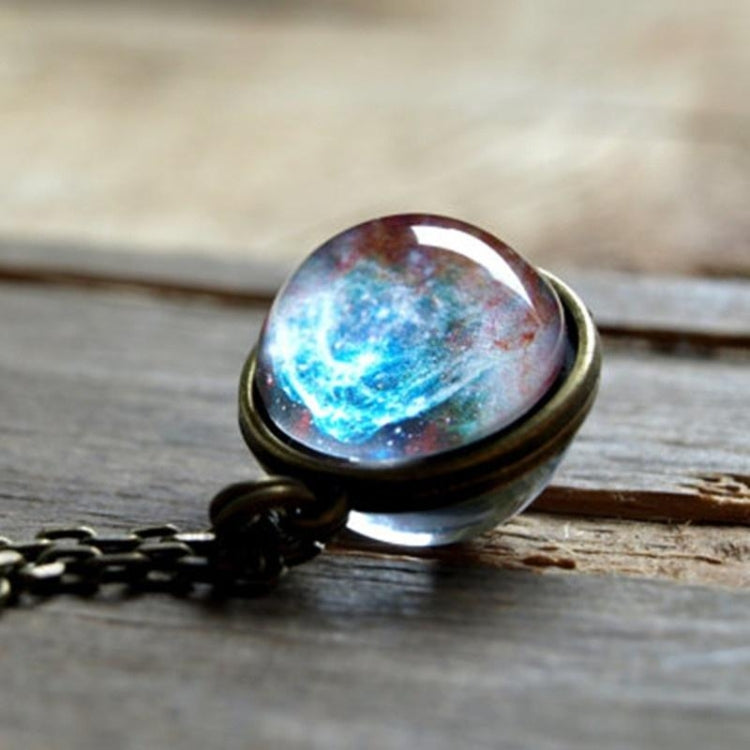 Round galaxy glass pendant with bronze bezel and black chain link