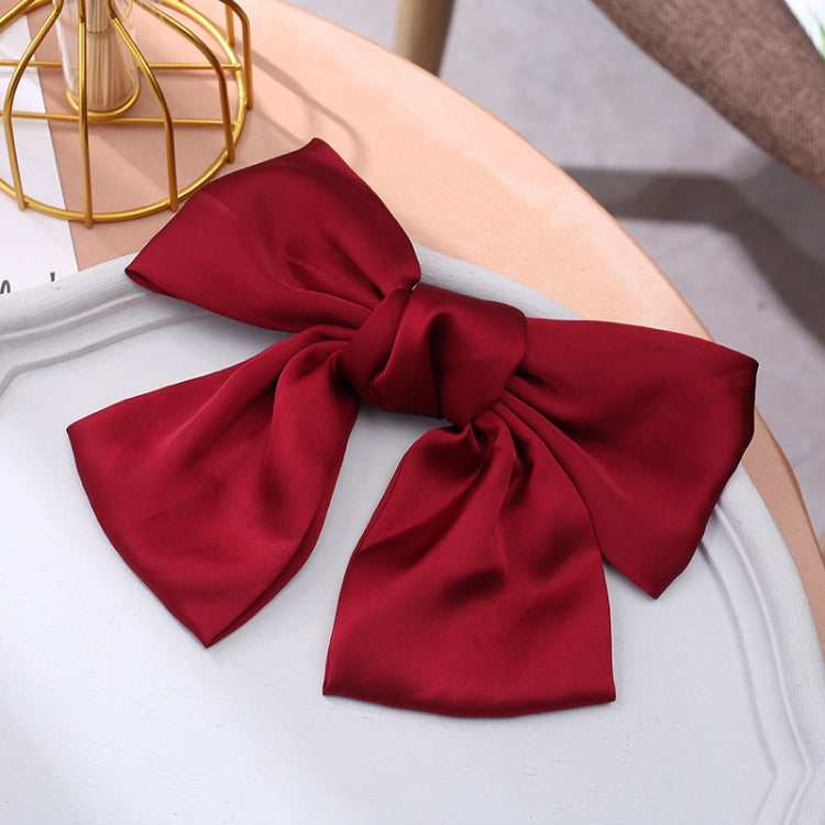 Wine red satin bow hairpin clip with looped ends and double-knot design