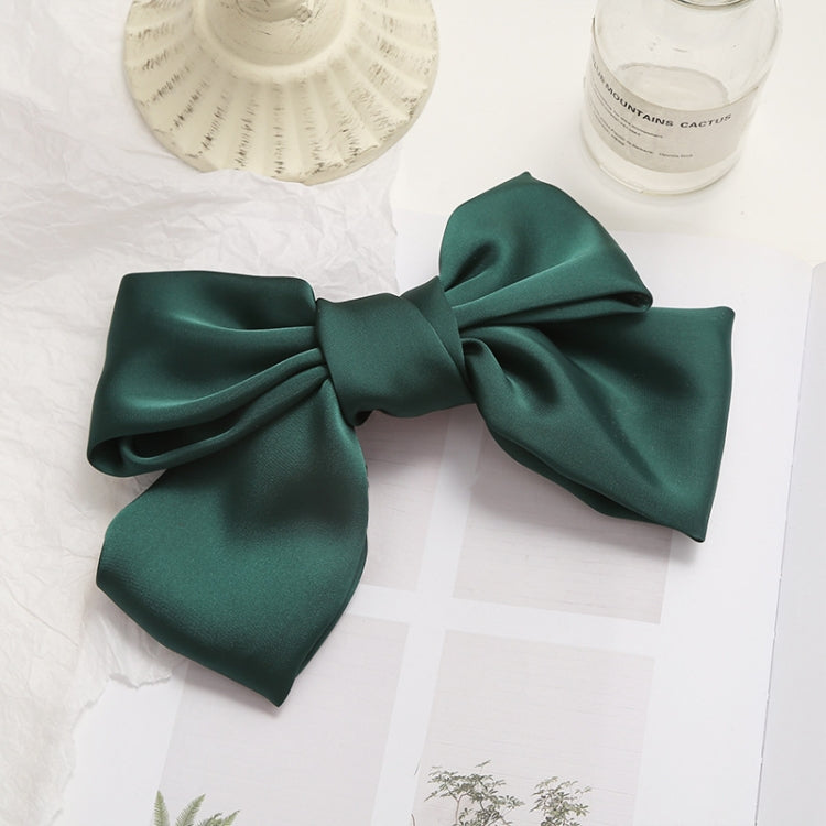 Dark green satin bow hairpin clip with wide loops and centered knot
