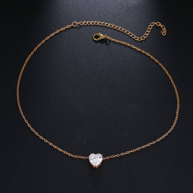 Gold-tone heart crystal pendant necklace with short chain