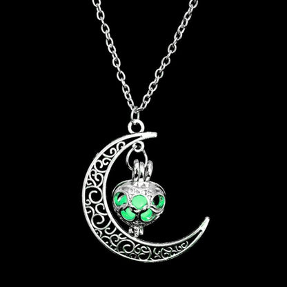 Green luminous crescent moon charm necklace with filigree pendant and silver chain