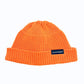 Orange knitted beanie hat with ribbed brim and pom top, one-size, branded label.
