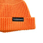 Orange short knit beanie with folded cuff and rectangular logo patch