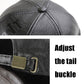 Black PU leather adjustable strap with gold-toned buckle on cap.