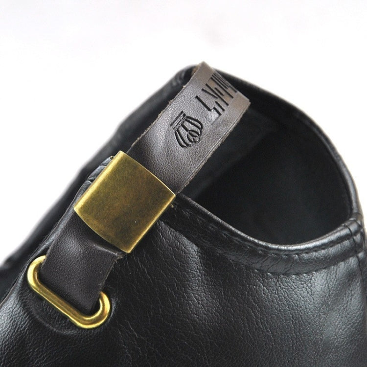 Black PU baseball cap, gold buckle detail on front strap and embossed inner patch