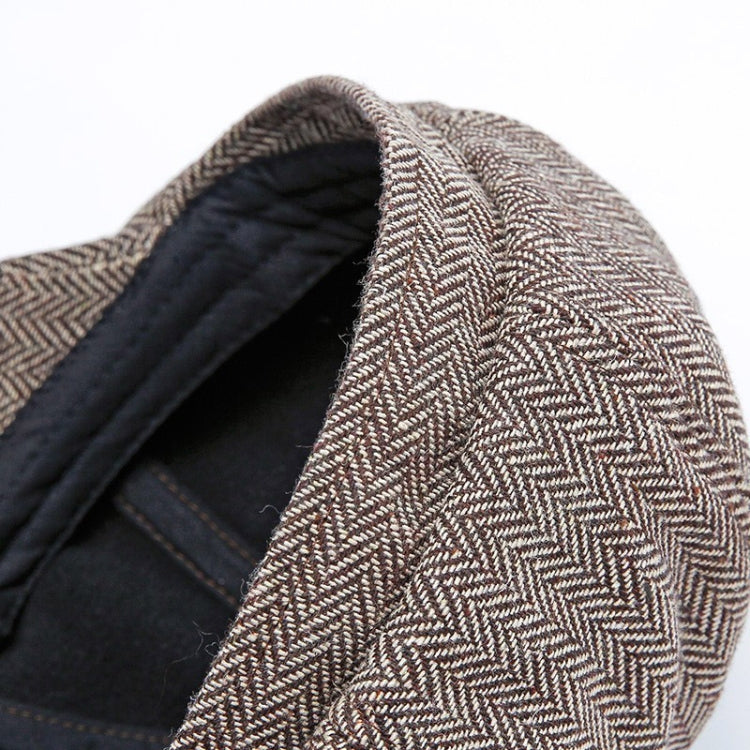 Octagonal snap beret hat close-up, open edge showing dark inner lining
