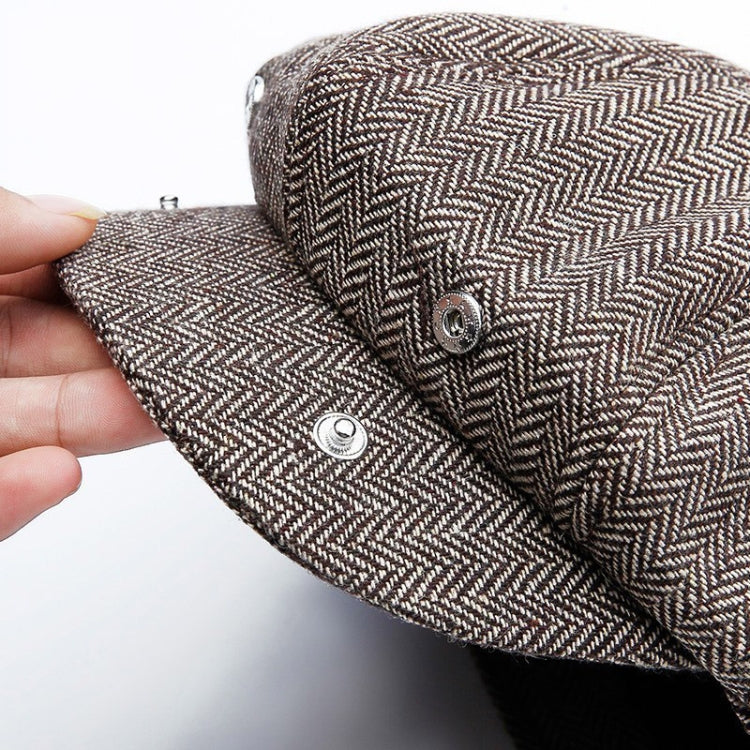 Octagonal snap beret hat close-up with metal snaps on the brim