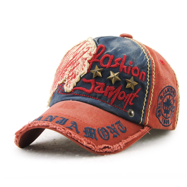 Casual baseball cap in coral and dark blue with embroidered letters, gold stars, and front patch.