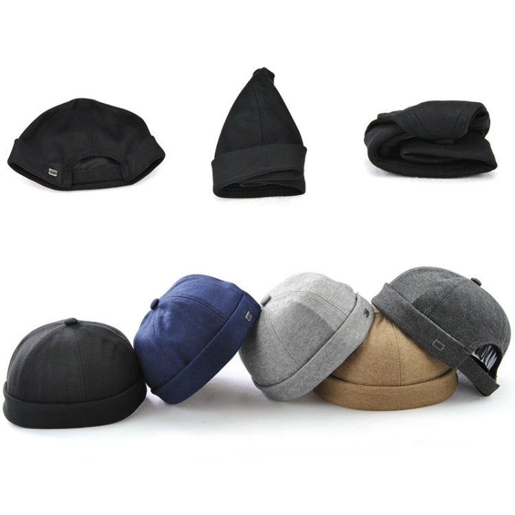 Retro skullcap hat with short flanged brim, shown in multiple colors from side views.