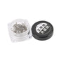 Toenail orthosis kit: clear container filled with silver metal clips and black cap
