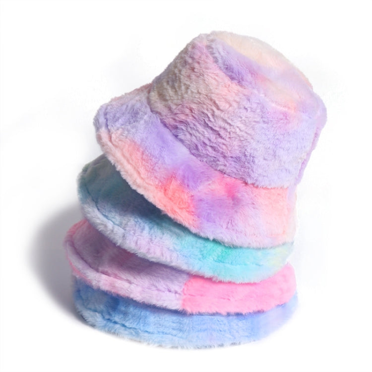 Plush rainbow fisherman bucket hats stacked, pastel pink, lavender, and blue tones.