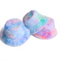 Plush rainbow fisherman bucket hats, pastel blue and lavender with pink highlights.