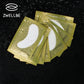 Gold foil packets with white half-moon under-eye patch pads for eyelash extensions