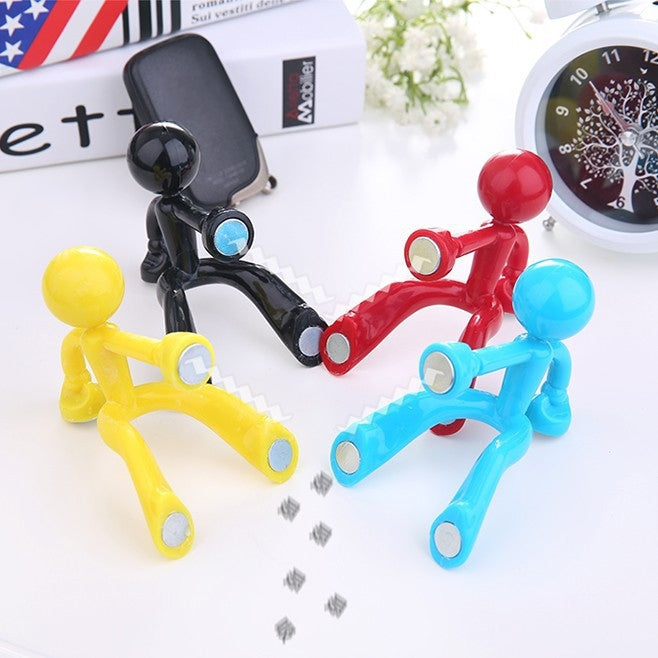 Set of 4 colorful humanoid magnet key hangers with metal keyrings attached.