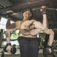 Wrist assist pull-up gloves worn while gripping a horizontal bar in the gym
