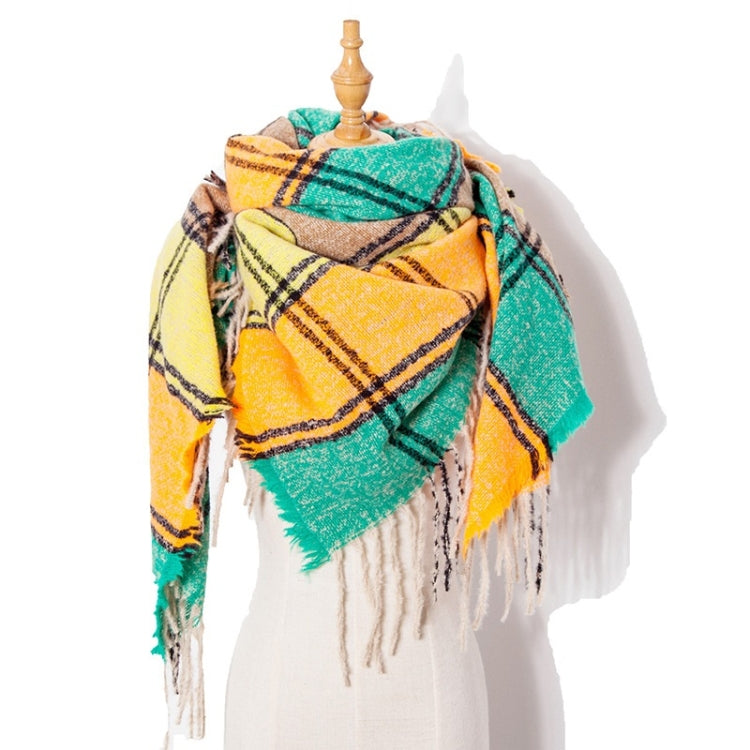 Plaid fringed scarf in yellow, teal, and brown with black check lines