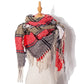 Plaid fringed scarf in red, gray, and black with white fringe tassels