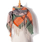 Plaid fringed scarf in orange, gray, and green with black check pattern
