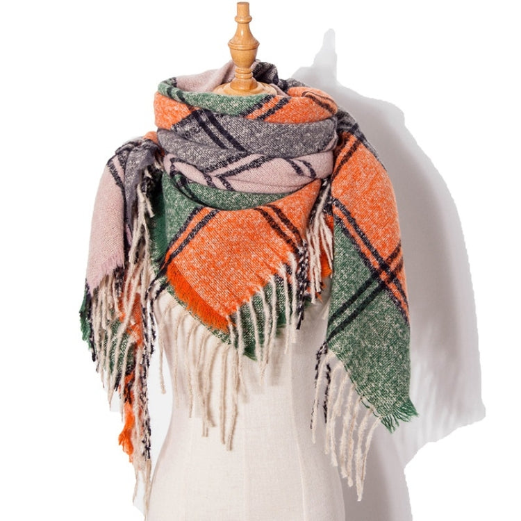 Plaid fringed scarf in orange, gray, and green with black check pattern