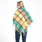Fringed plaid square scarf, back view, teal and tan with black grid lines