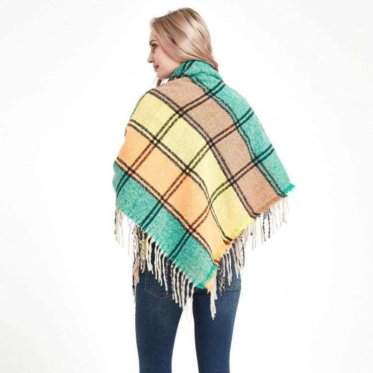 Fringed plaid square scarf, back view, teal and tan with black grid lines