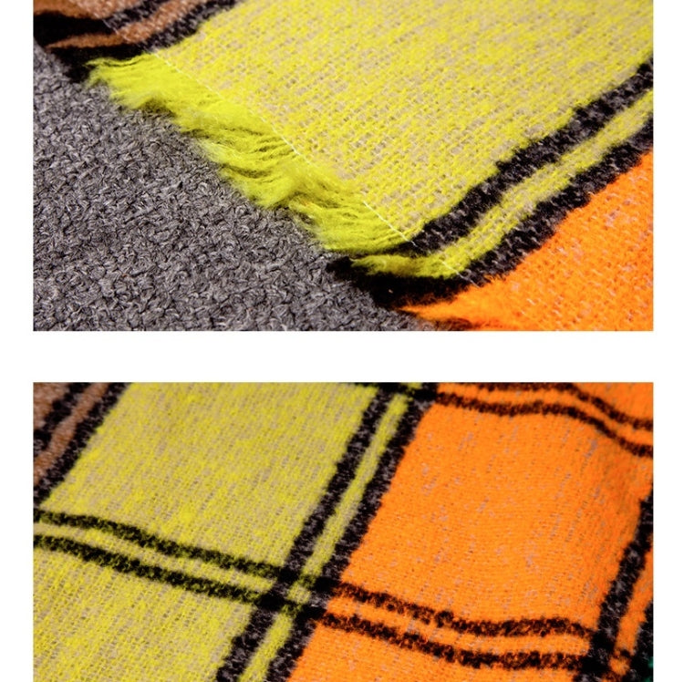 Plaid scarf fabric close-up, yellow and black stripes with bright orange border