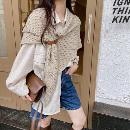 Cream knitted triangle shawl scarf with leather buckle strap and fringe edges