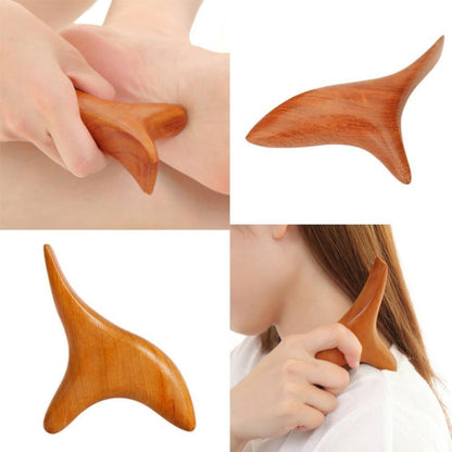 Wood massage tool with star-shaped handle, used on forearm and shoulder