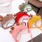 Set of baby knitted antler hats in brown, red, pink, and yellow with tie strings