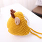 Yellow knit baby antler hat with brown pom-pom detail and side tie strings