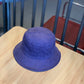 Purple corduroy fisherman hat with wide brim and foldable crown