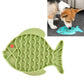 Green silicone fish-shaped slow food mat with raised channels and divider grooves