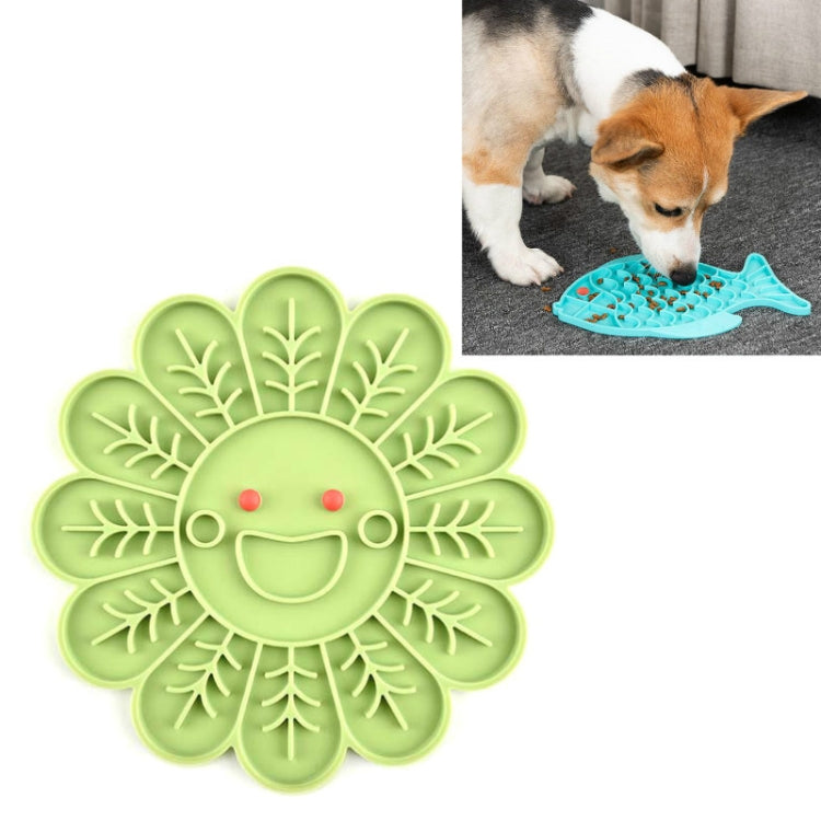 Green silicone flower-shaped slow food mat with raised leaf sections and dots