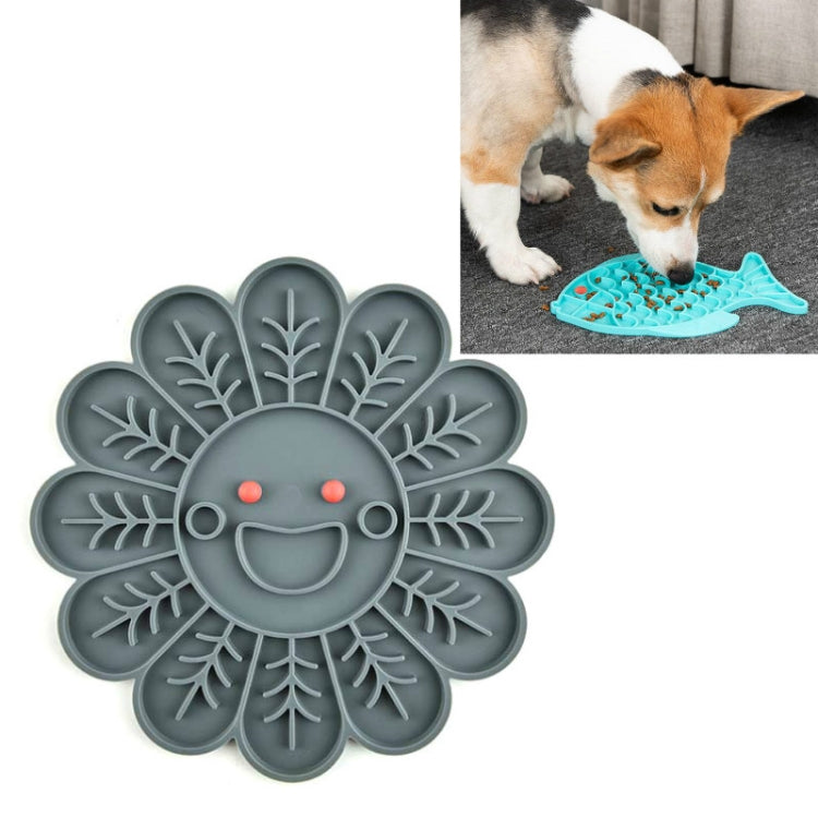 Gray silicone flower-shaped slow food mat with raised leaf sections and dot texture