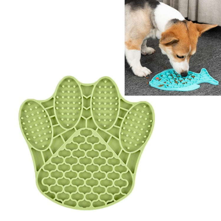 Green silicone paw-print slow food mat with raised ridges and textured dot pads