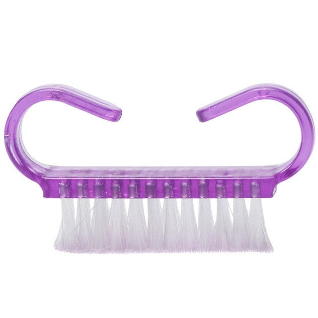 Purple angled nail cleaning brush with clear bristles and U-shaped handle