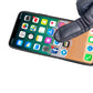 Dark protective gloves demonstrating touchscreen control on a smartphone screen