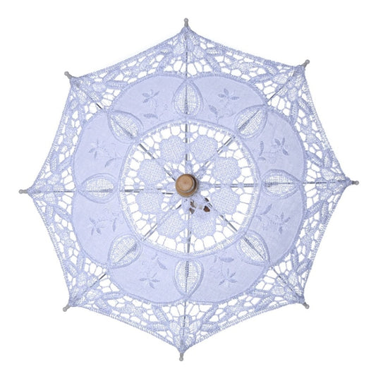 White lace bridal umbrella with floral cutout pattern and wooden center knob