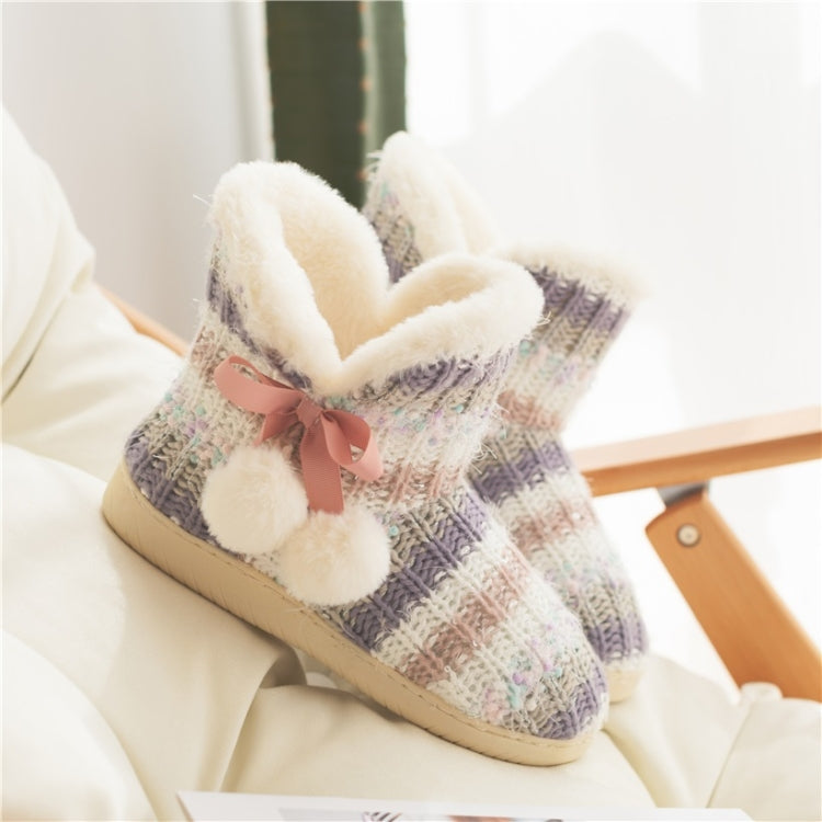 Pair of multicolor knit home boot slippers with fluffy trim and pink bow, thick outsole