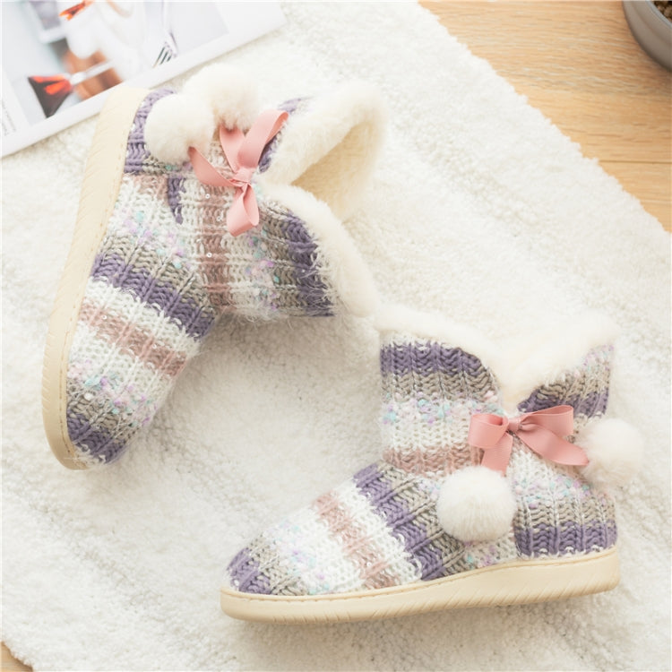 Home boot slippers featuring multicolor knit fabric, soft plush lining, pink bow