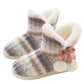 Cozy multicolor knit slippers with fluffy sherpa lining, pink bow detail, thick sole