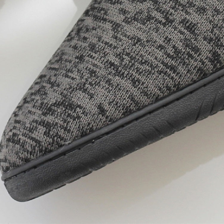 Side close-up of men's high-top slippers showing dark gray sole edge and textured platform