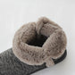 Front view of men's high-top slippers with beige faux-fur collar and dark gray fabric upper